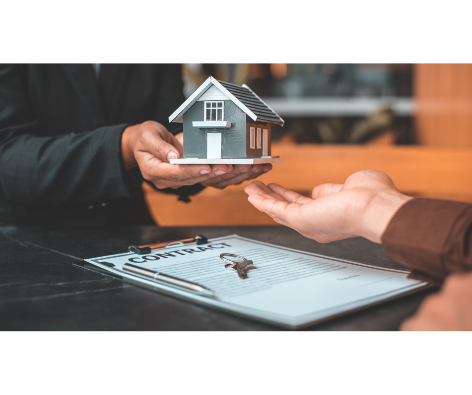 michigan landlord insurance - hands holding a house